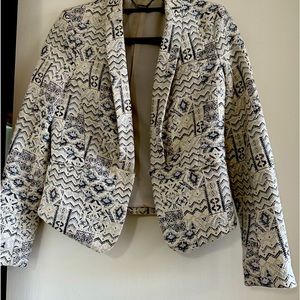 Sparkly silver and white cotton and polyester jacket!Great for holiday season!